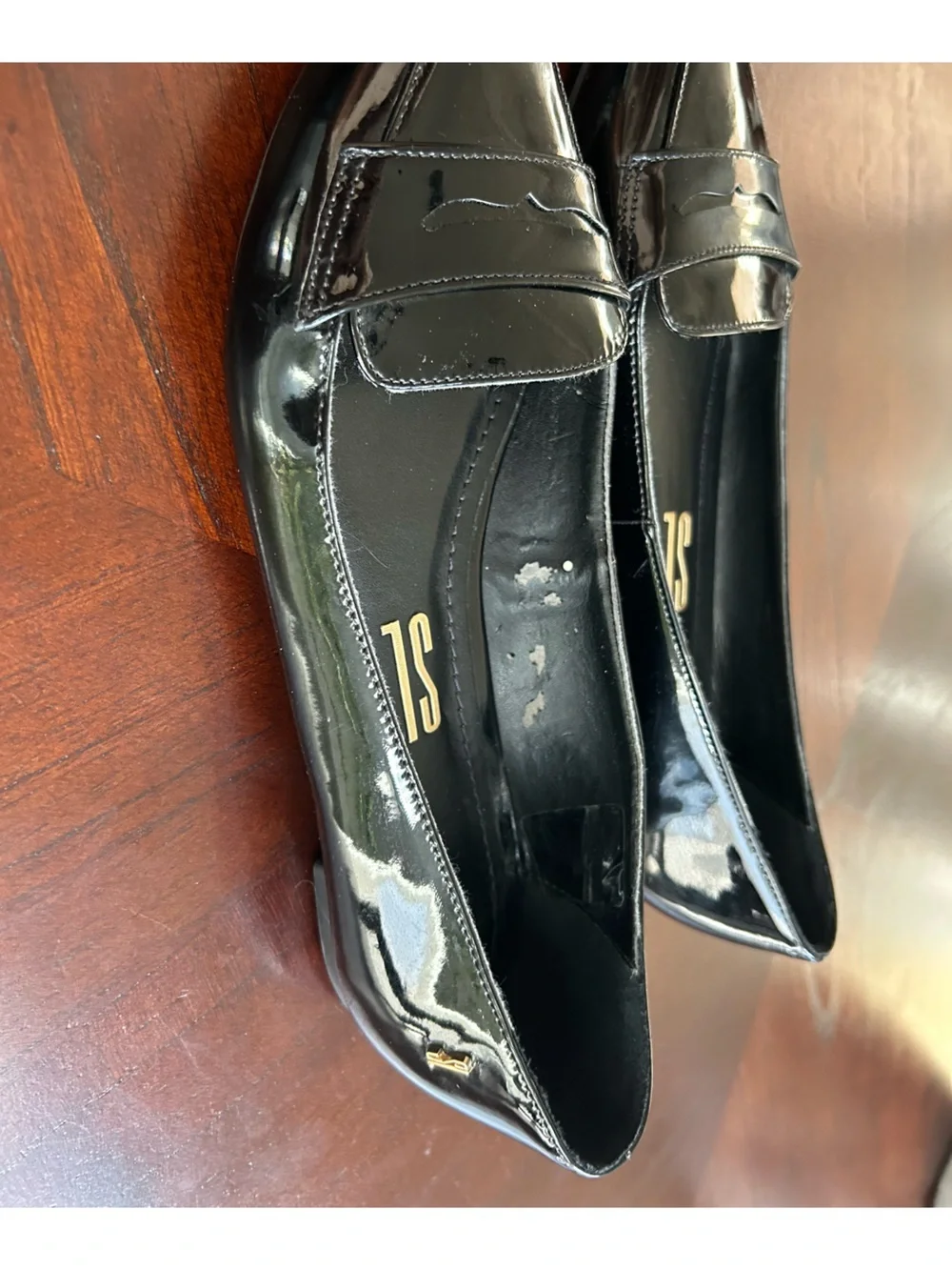 Pointed Toe Black Patent Loafer Flats size 8B It shows wear on the inside.